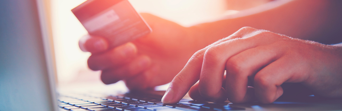 Close-up of hand on keyboard.