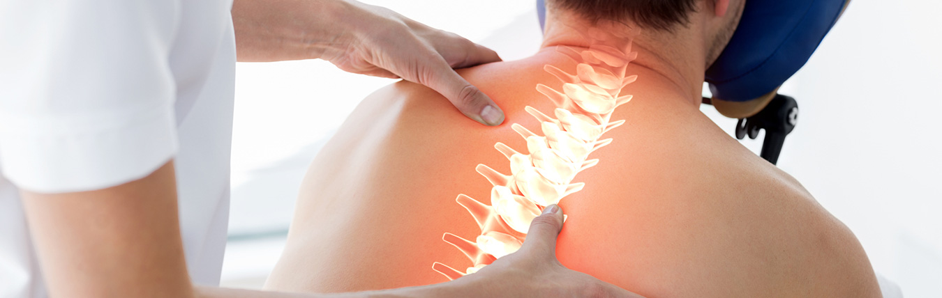 View of man having back adjusted.