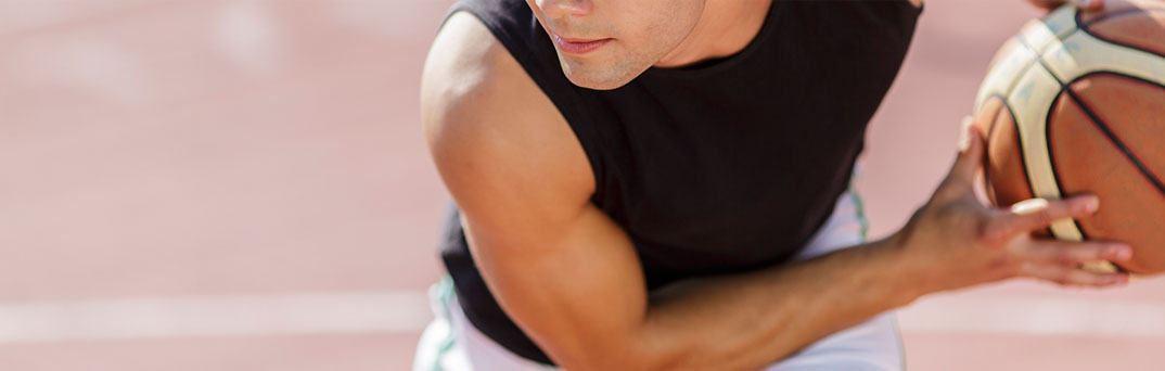 Man with basketball.